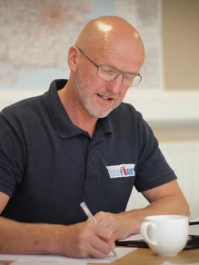 Nigel Bates writing.