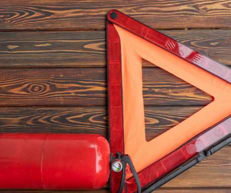 Fire extinguisher with triangle object.